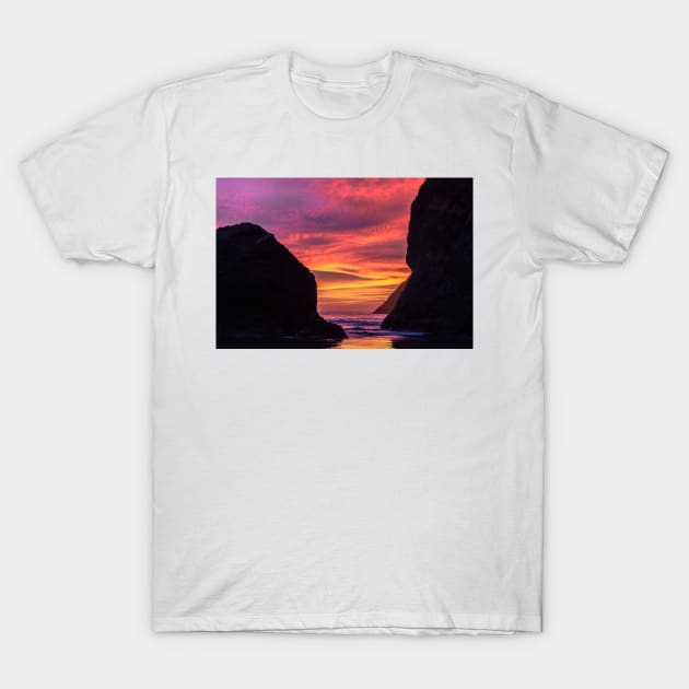 Colorful sunset between two rocks T-Shirt by blossomcophoto
